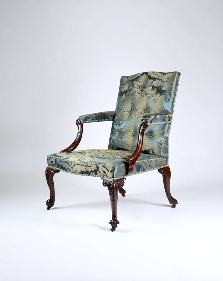 A Rare George III Carved Mahogany 'Gainsborough' Armchair